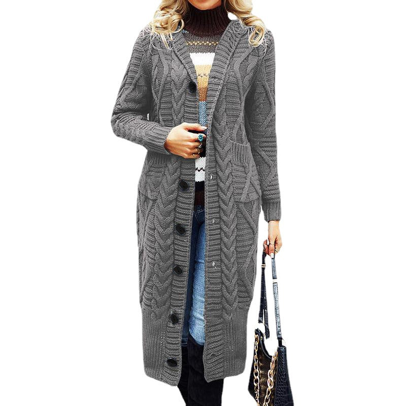 Ladies elegant knit coat with a deep V-neck and an elaborate cable pattern Lune London