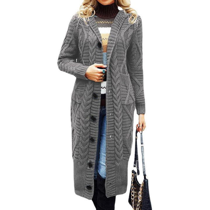 Ladies elegant knit coat with a deep V-neck and an elaborate cable pattern Lune London