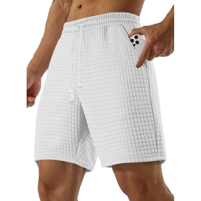 Men's sports shorts in breathable material with practical side pockets Lune London