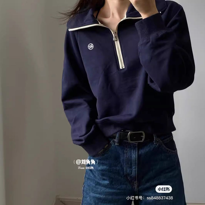 Pull à capuche stylé pour femme avec demi-zip Chic & Stil