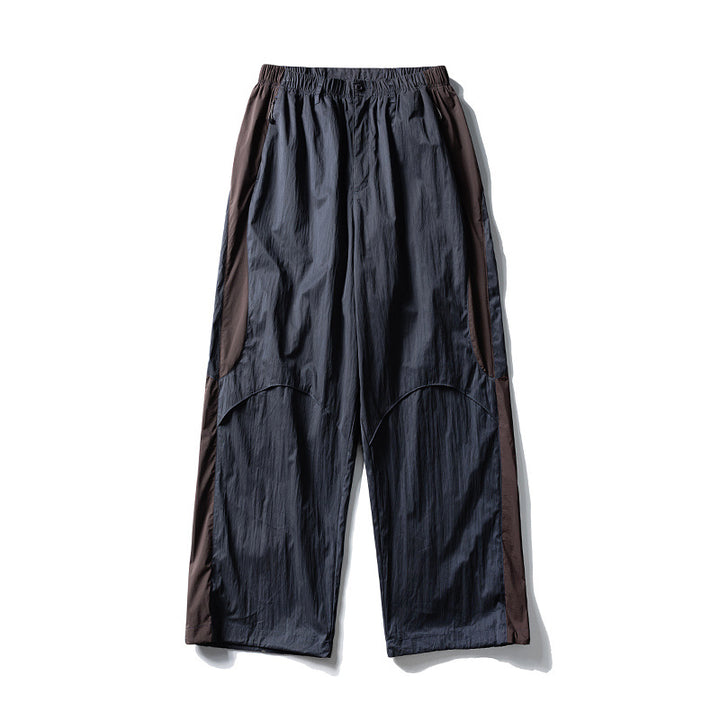 Men's loose technical nylon cargo pants with elastic waistband and panel details Amarae