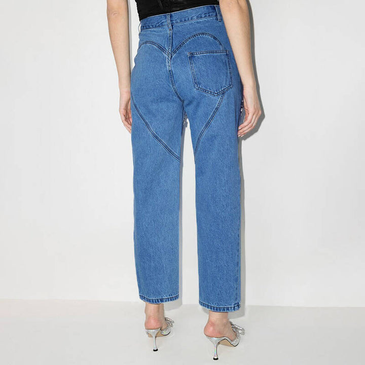 Women's jeans with decorative cutouts and rhinestone accents Lune London