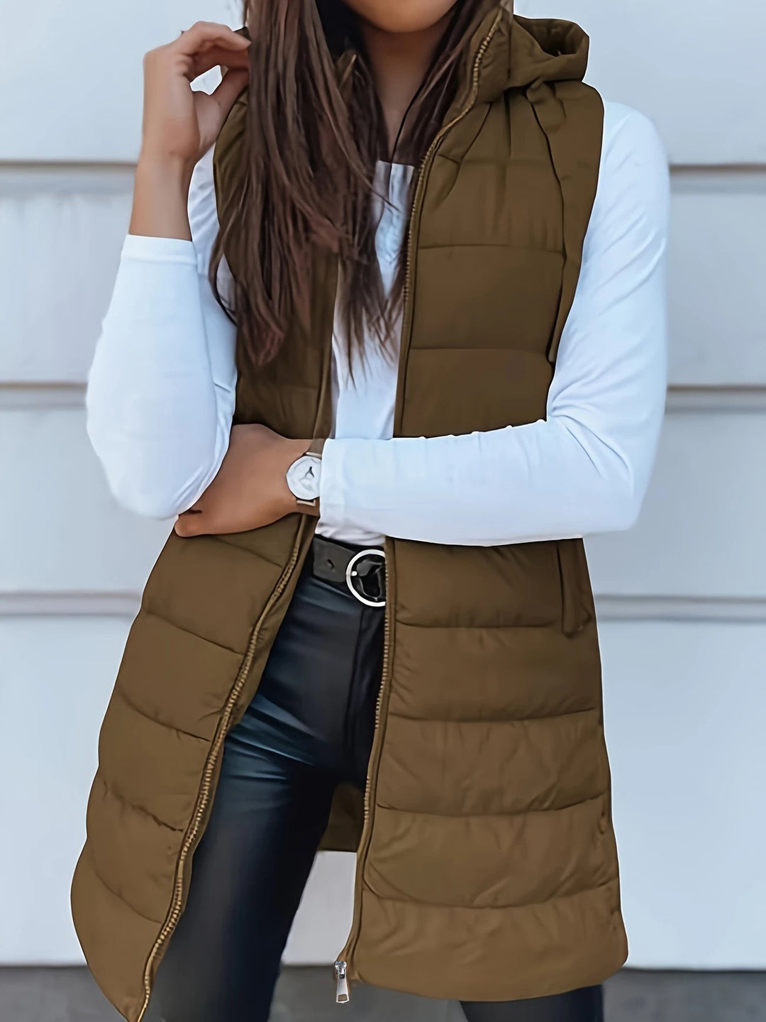 Quilted hooded vest for women with zipper closure and practical pockets Lune London