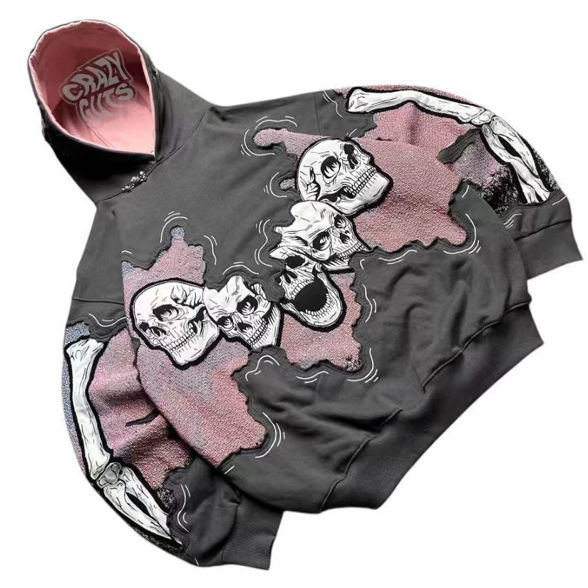Haut à capuche pour femmes avec impression de crâne frappante Chic & Stil