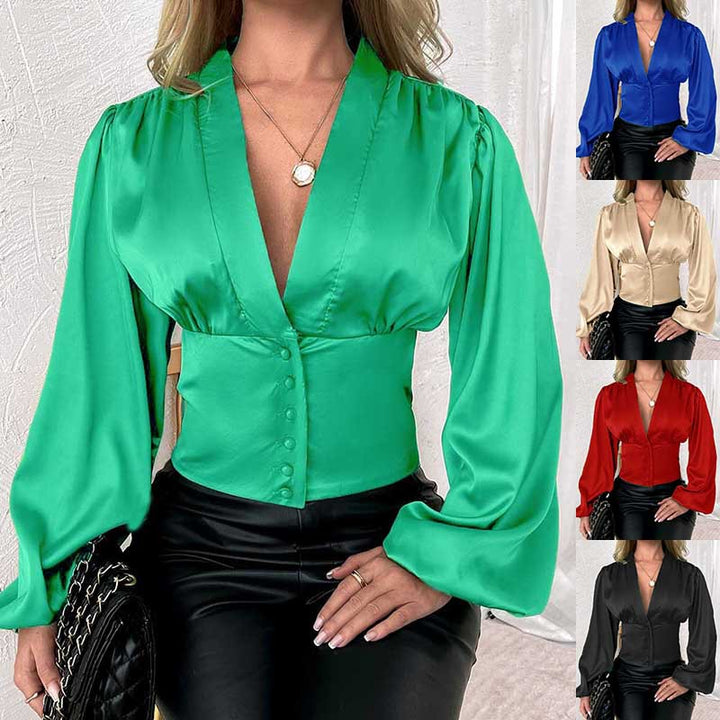 Blouse féminine avec décolleté en V profond et manches bouffantes Chic & Stil