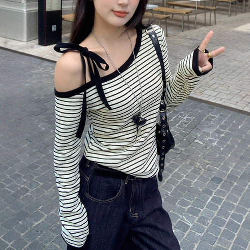 Women's off-shoulder long-sleeve shirt with striped design and decorative bow details Chic & Stil