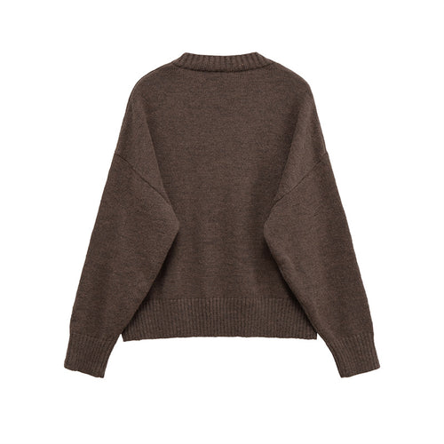 Comfortable knitted sweater for women with V-neck and generous fit Amarae