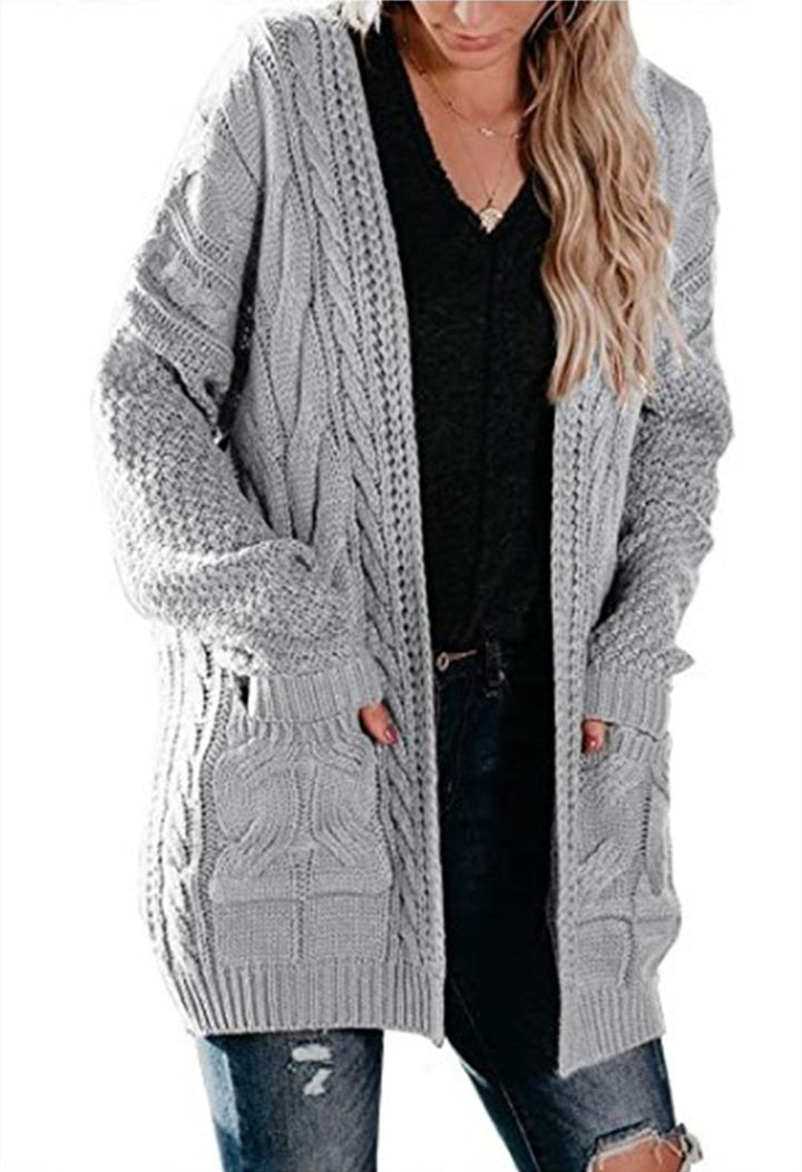 Thick knit jacket for women with deep pockets and textured cable pattern Lune London