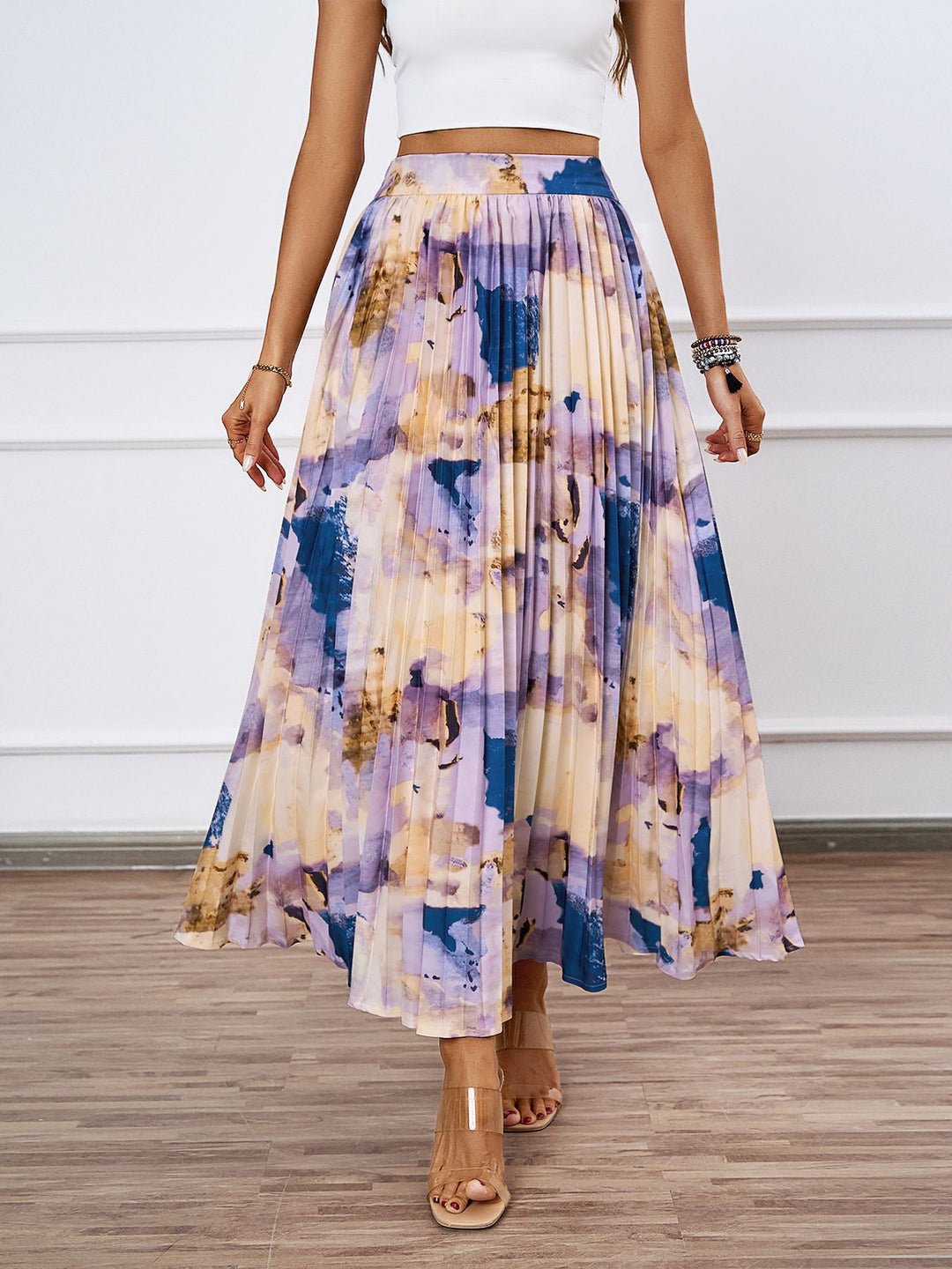 Pleated midi skirt for ladies with a colorful watercolor design Lune London