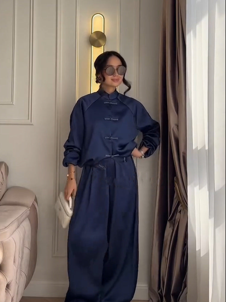 Women’s satin two-piece with traditional toggle closures and wide pants skirt Amarae