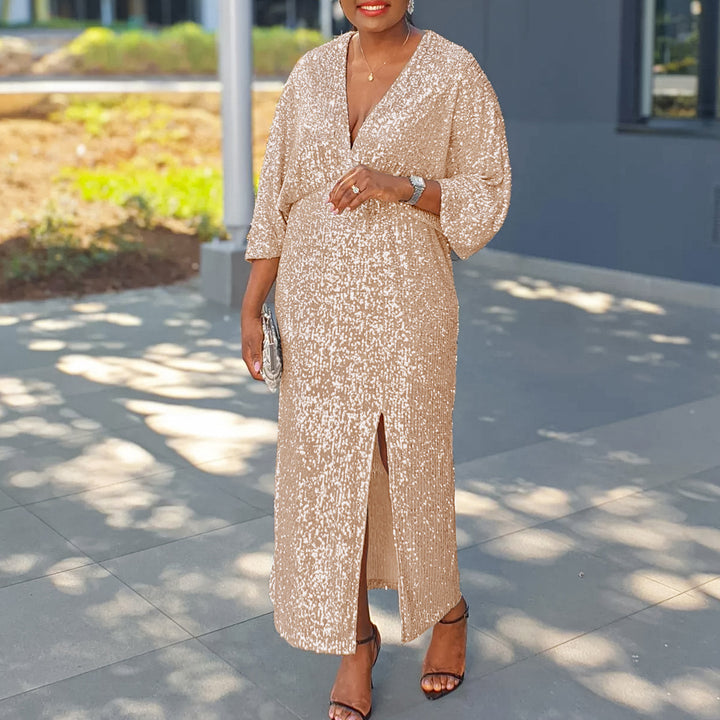 Sparkling evening dress for women with deep slit and luxurious puff sleeves Lune London