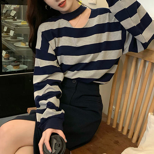 Women’s long sleeve shirt with modern stripes and an elegant neckline