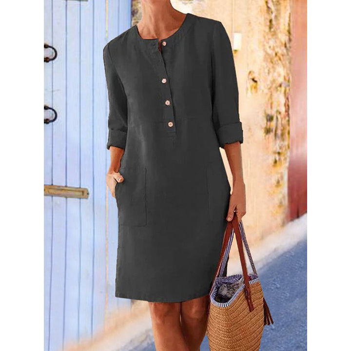 Women loose-fitting linen-look dress with three-quarter sleeves, button placket and side pockets Amarae