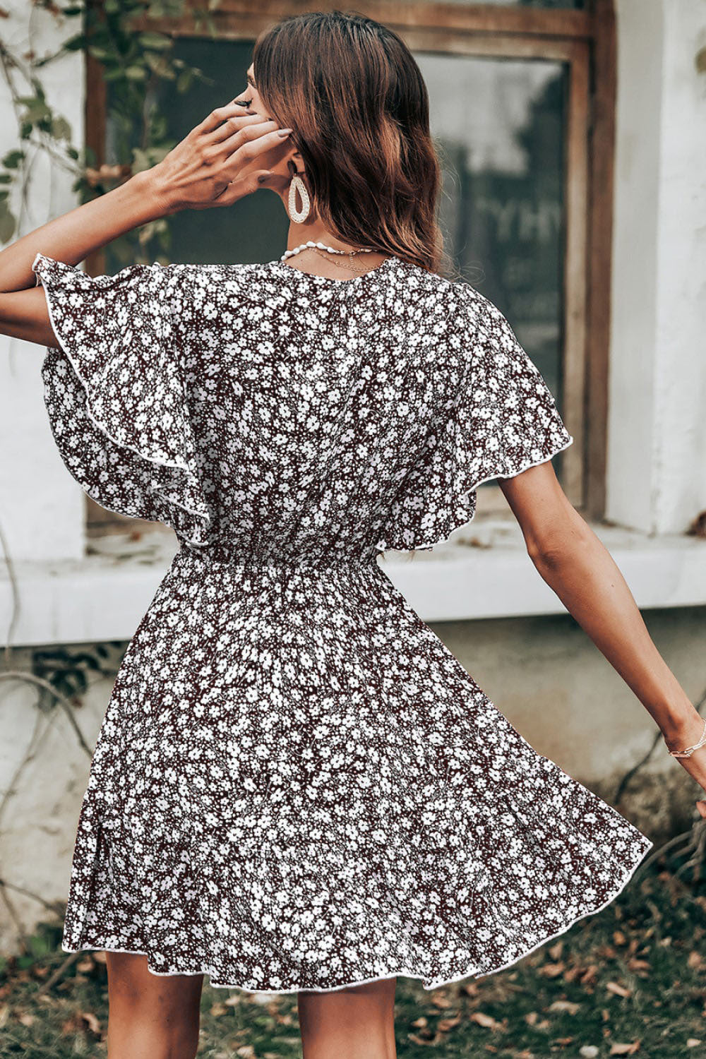 Ladies Twirl Dress with Flowing Floral Sleeves Lune London