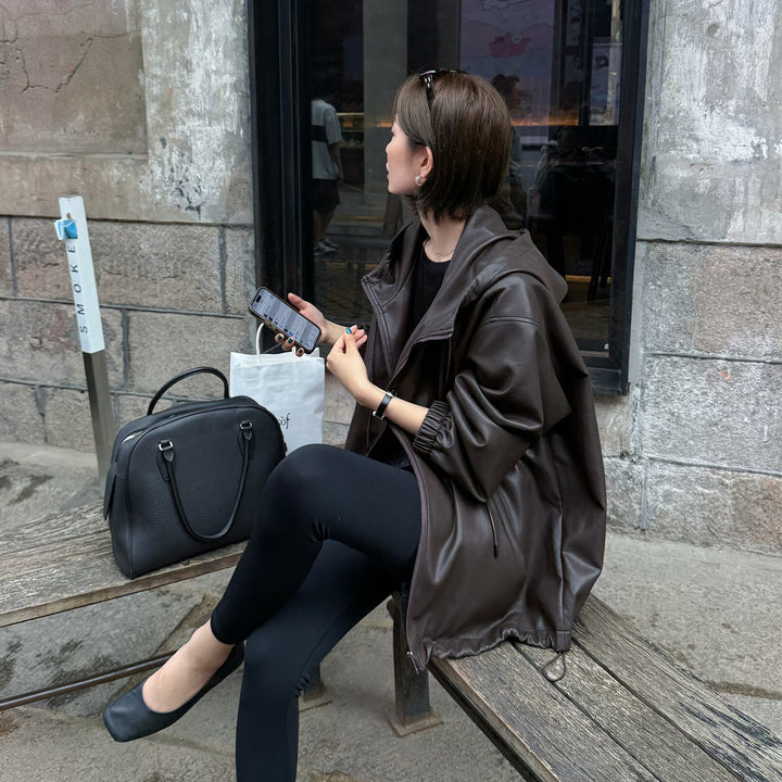 Fashionable lambskin leather jacket for women with practical hood and relaxed fit Lune London