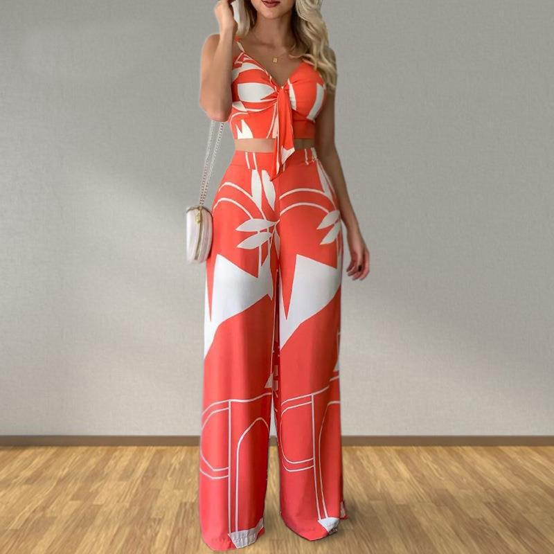 Ensemble Élégant Femme avec Combinaison de Haut Court et Pantalons Amples Chic & Stil