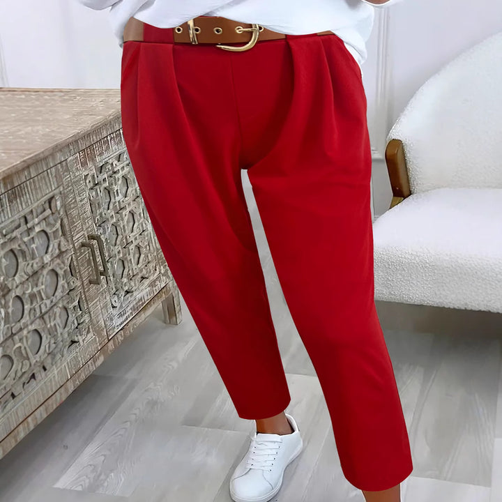 Elegant high-waisted pants for women with decorative pleats and practical pockets Lune London