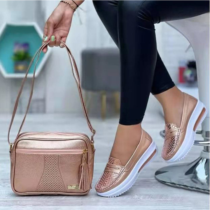 Women's comfortable Slip-On shoes with a stylish snake leather design and a cushioned sole Lune London