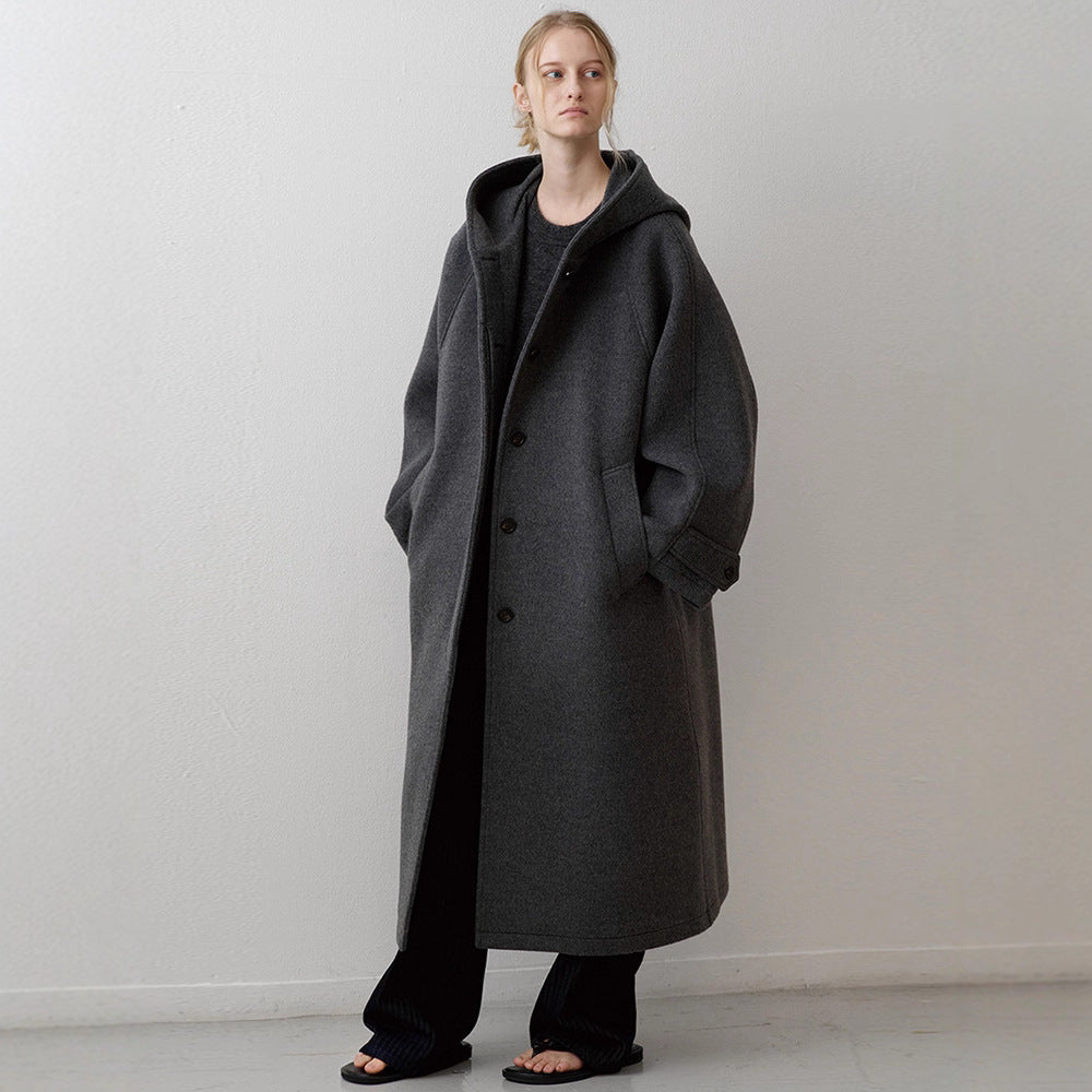 Manteau surdimensionné élégant pour femmes avec capuche et poches pratiques Chic & Stil