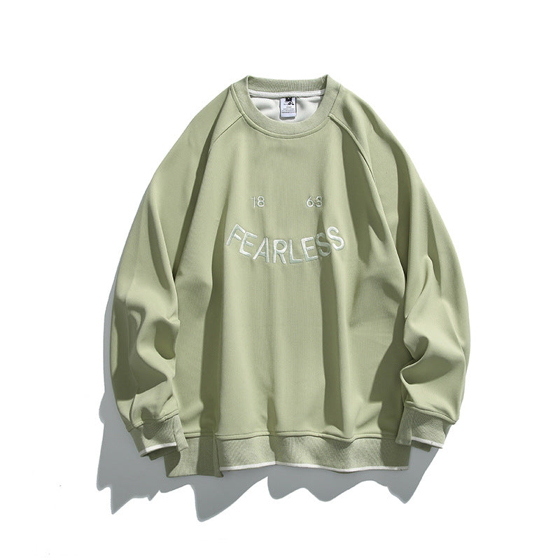Unisex Oversize Sweatshirt with raglan sleeves and distinctive FEARLESS front print Amarae