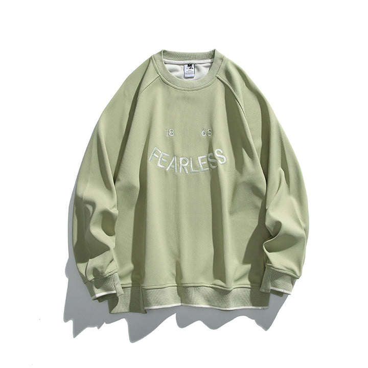 Unisex Oversize Sweatshirt with raglan sleeves and distinctive FEARLESS front print Amarae