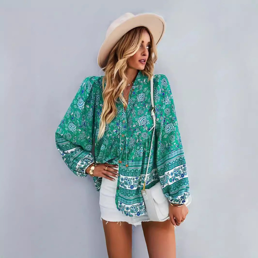 Woman blouse with colorful floral pattern and puff sleeves Lune London