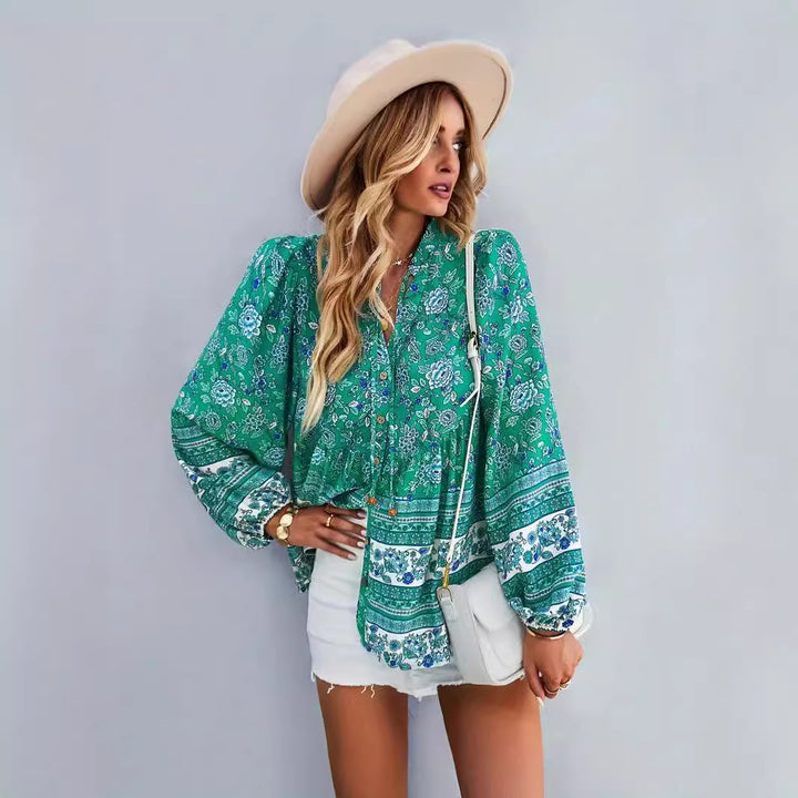 Woman blouse with colorful floral pattern and puff sleeves Lune London