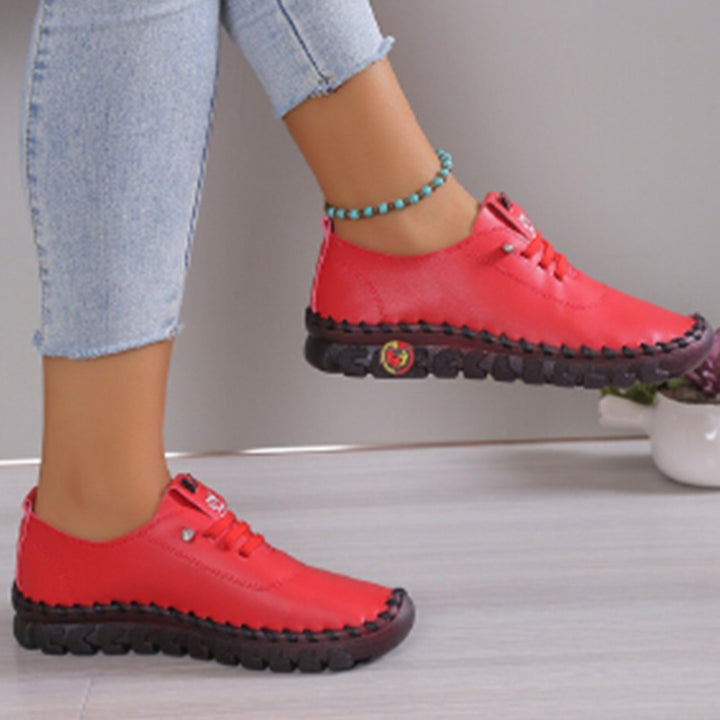 Women's lightweight, soft slip-on with hand-stitched rubber sole and elastic lacing Amarae