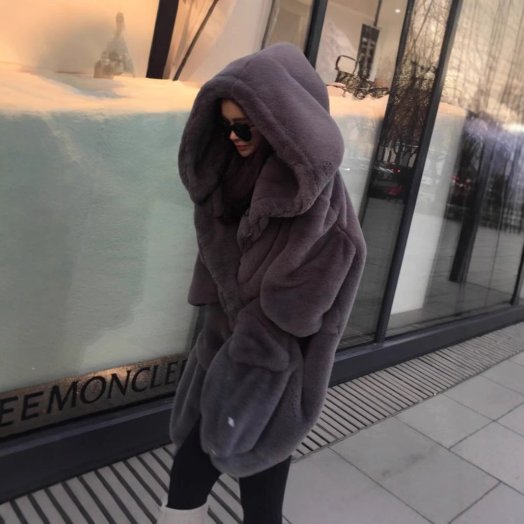 Oversized faux fur coat for women with hood and pockets Lune London