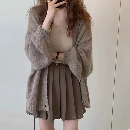 Oversized casual knit jacket for women with voluminous sleeves and practical pockets Amarae