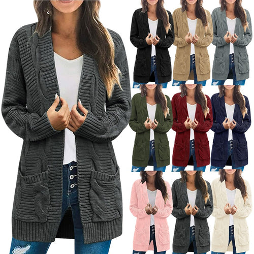 Ladies chunky knit cardigan with elegant cable patterns and practical pockets Amarae