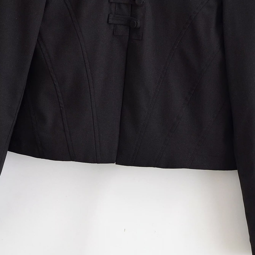 Women's cropped short jacket with stand-up collar, boxy silhouette and minimalist yoke.