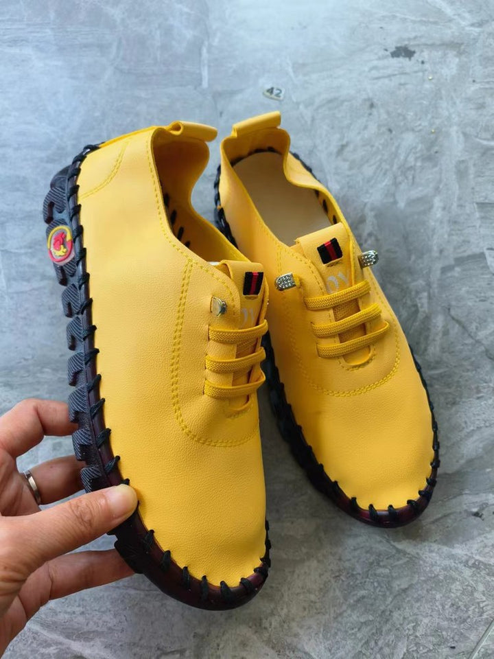 Women's lightweight, soft slip-on with hand-stitched rubber sole and elastic lacing Amarae