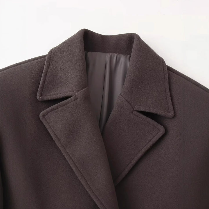 Elegant wool coat for women with deep lapels and practical pockets Amarae