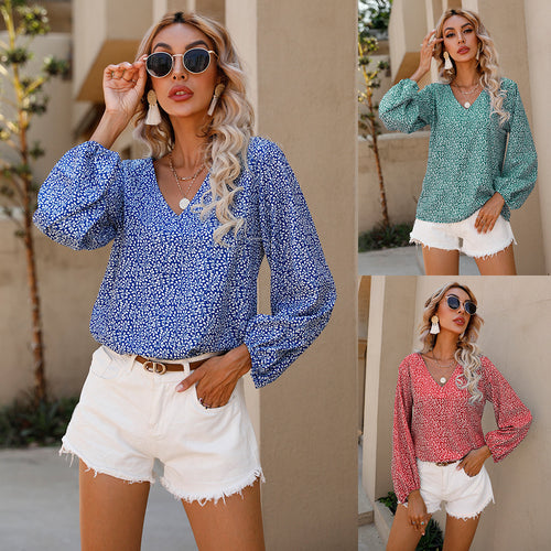 Women’s blouse with voluminous sleeves and V-neck Amarae