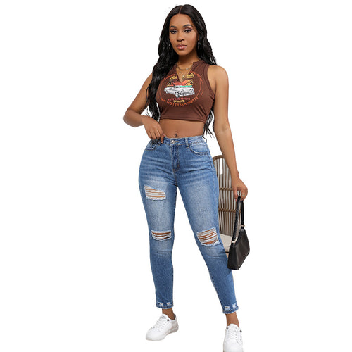 High-waisted women’s jeans with a trendy ripped look featuring strong tear details Amarae