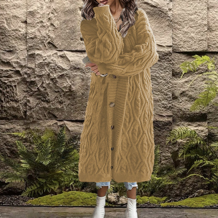 Thick knit coat for women with an elegant cable structure and practical buttons Amarae