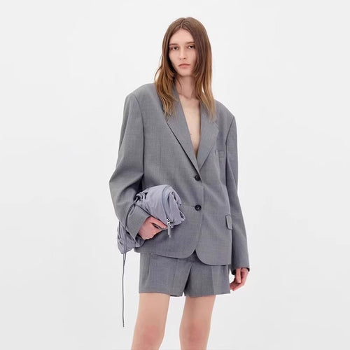 Blazer surdimensionné élégant pour femmes avec motif à carreaux subtil Chic & Stil