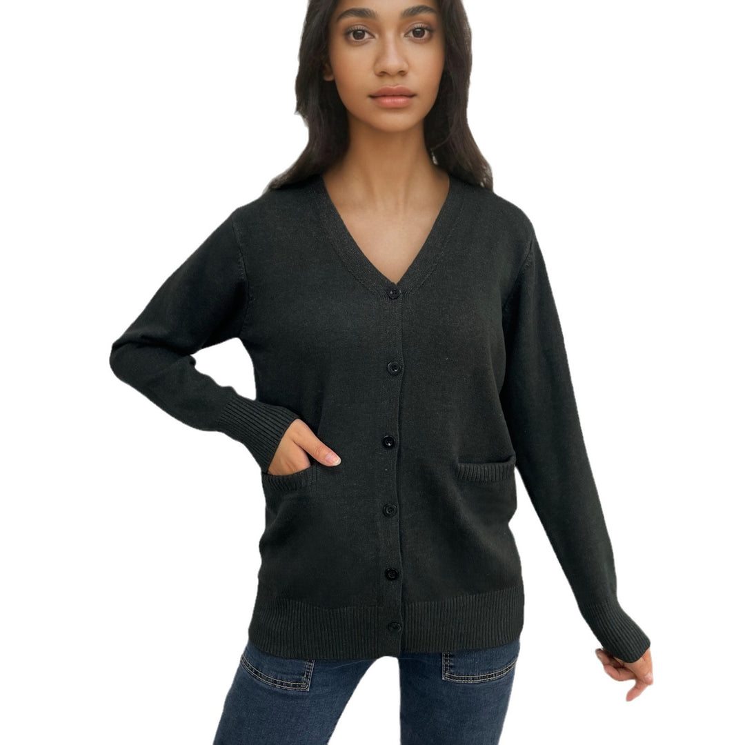 Cardigan pour femmes avec motif à côtes fines et poches pratiques Chic & Stil