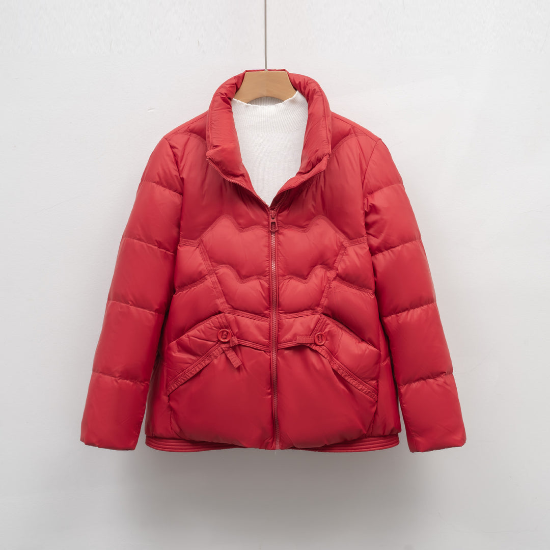Quilted jacket for women with decorative button details and a high collar Lune London