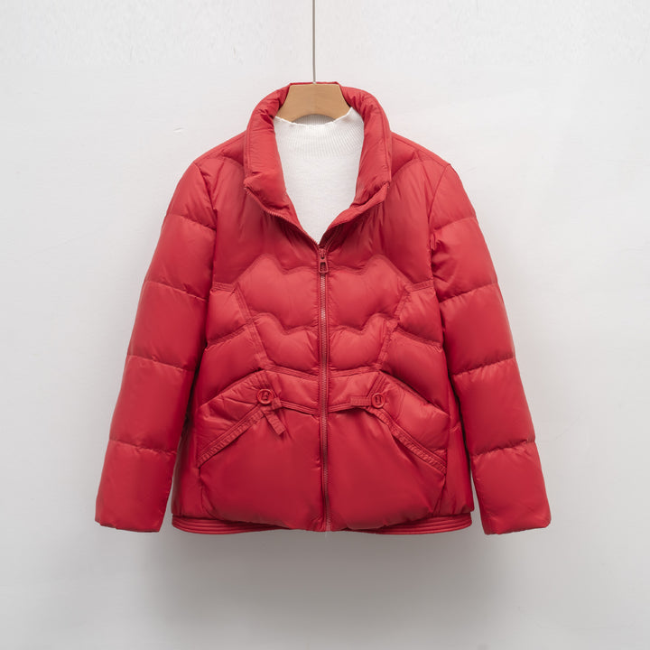 Quilted jacket for women with decorative button details and a high collar Lune London