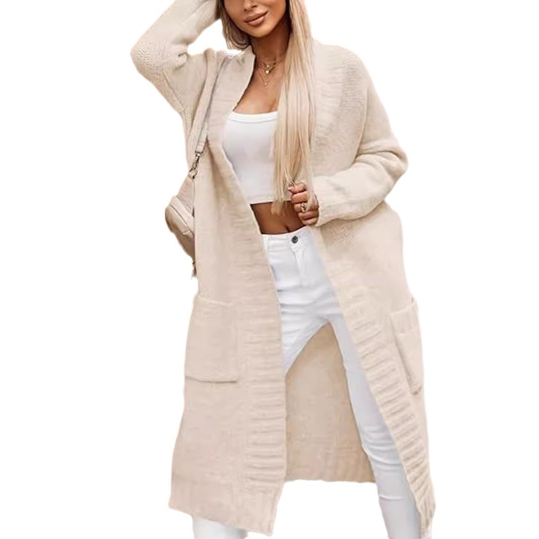 Long women's knitted coat with deep pockets and open cut Lune London