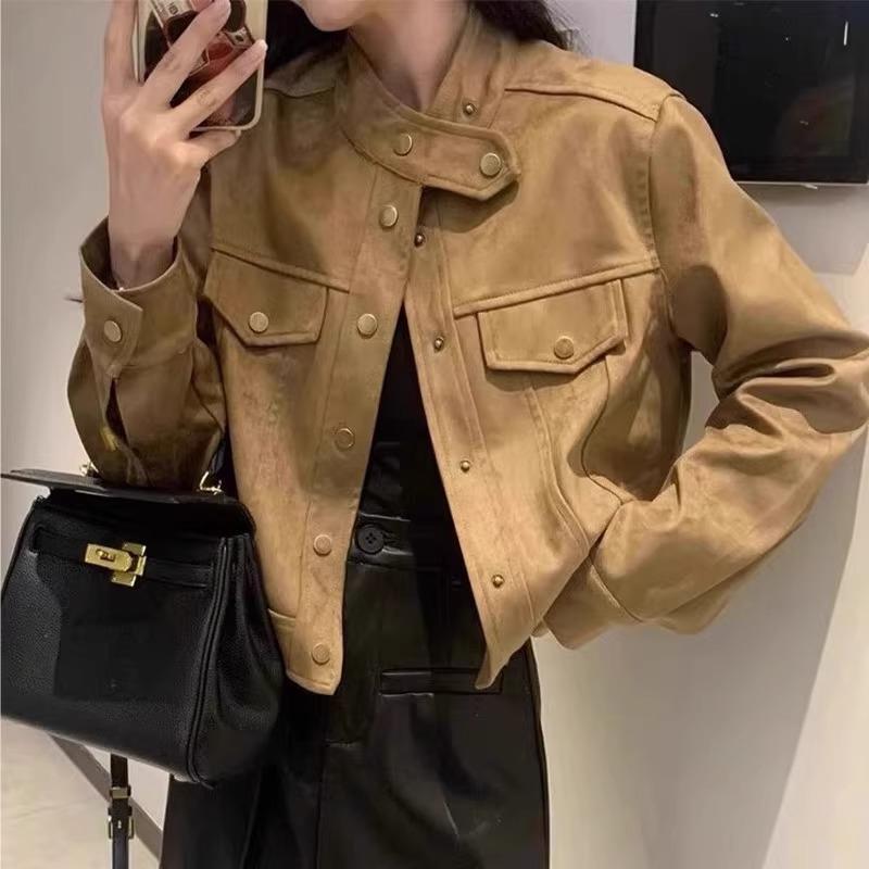 Fashionable short jacket for women in mixed styles with pockets and button details Lune London