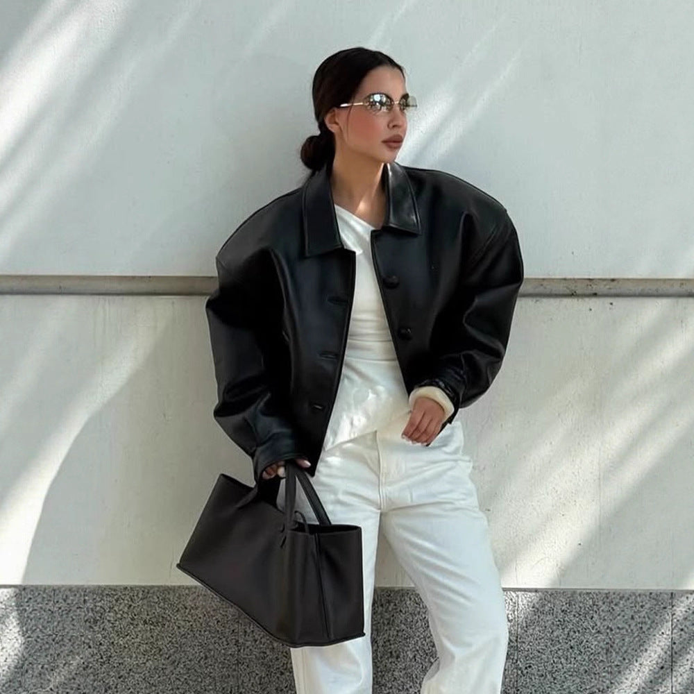 Women's short jacket made of vegan leather imitation in boxy cut with oversized shoulders and hidden button placket Amarae