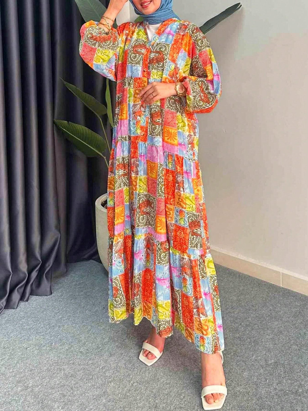 Maxi dress for women in boho style with a colorful patchwork design and wide sleeves Lune London