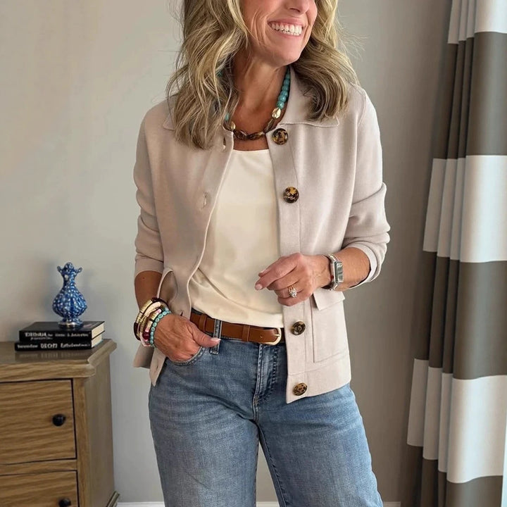 Women's short knitted cardigan with shirt collar, patch pockets, and horn buttons Amarae