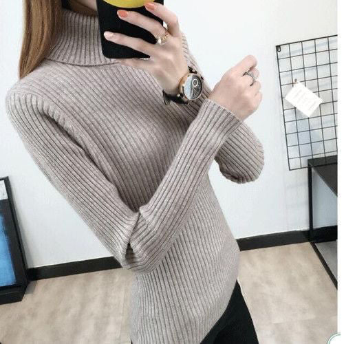 Pull femme en laine de haute qualité avec col roulé et texture côtelée Chic & Stil