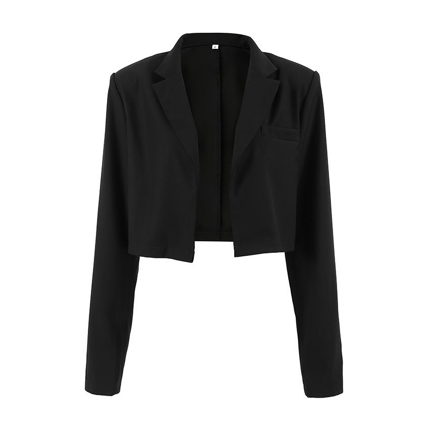 Short fitted jacket for ladies with a modern look featuring a high collar and elegant button details Lune London