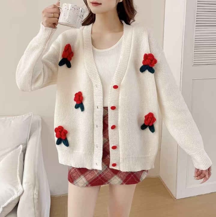 Women’s playful knitted cardigan with floral appliqués and Moon London button details