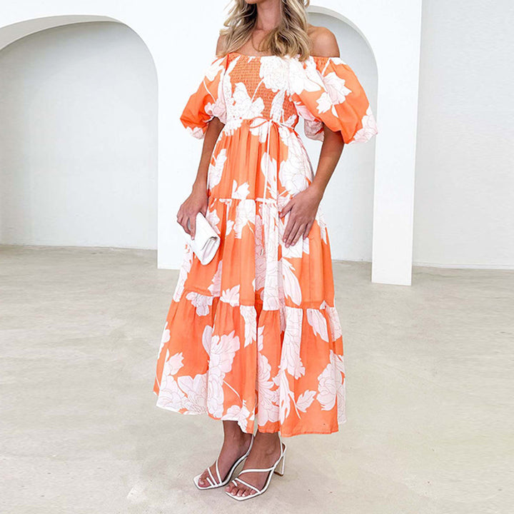 Robe Maxi pour femmes avec de volumineuses manches bouffantes et un design floral Chic & Stil